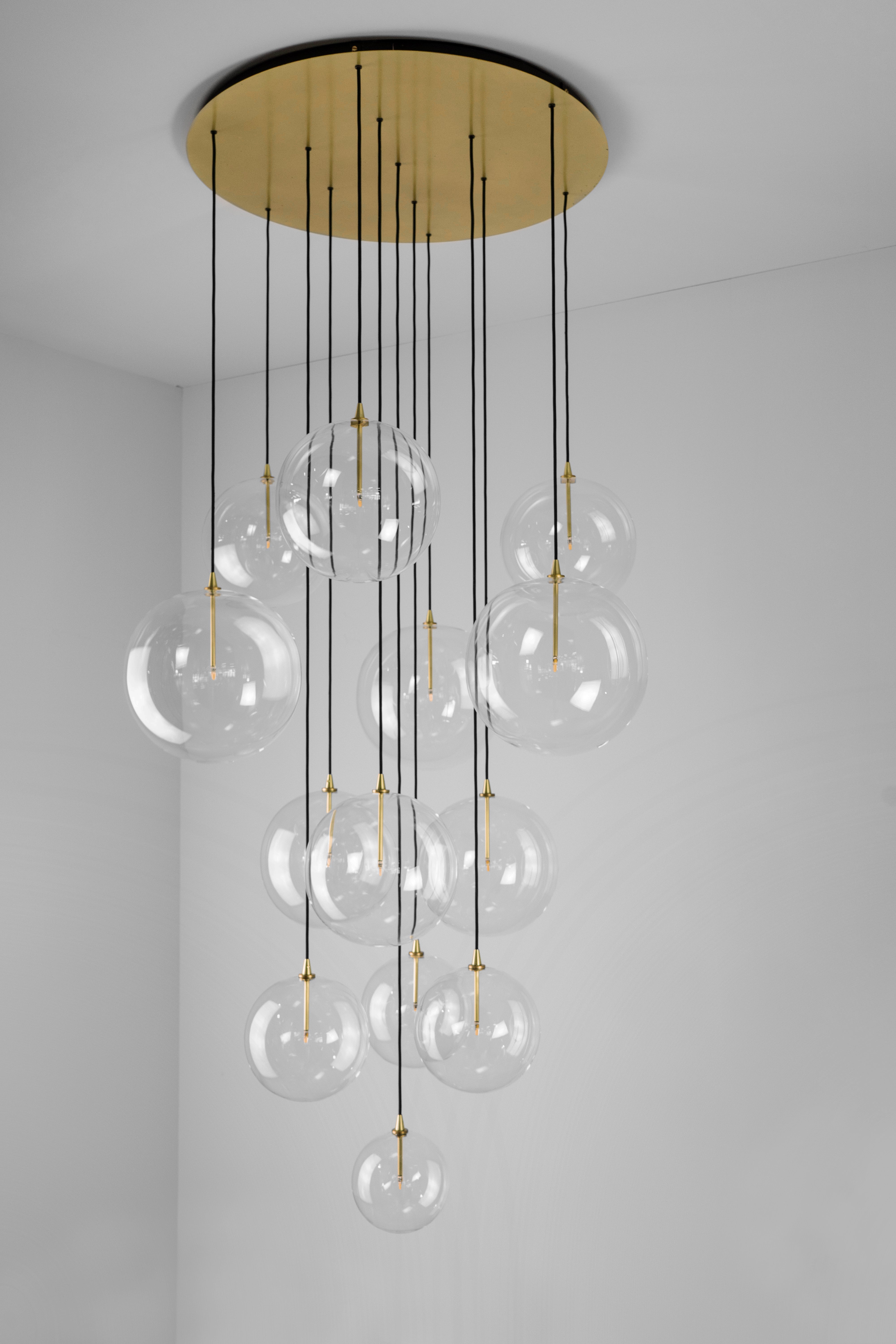 Schwung Cluster 13 Burnished Brass Transparent Globe Mix Chandelier